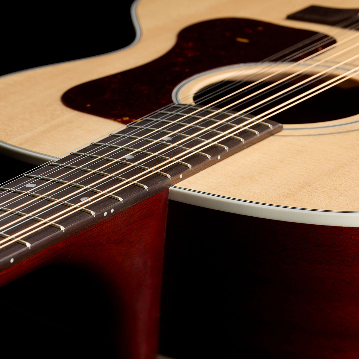 Top down view of F-412 Standard Natural neck and strings thumb