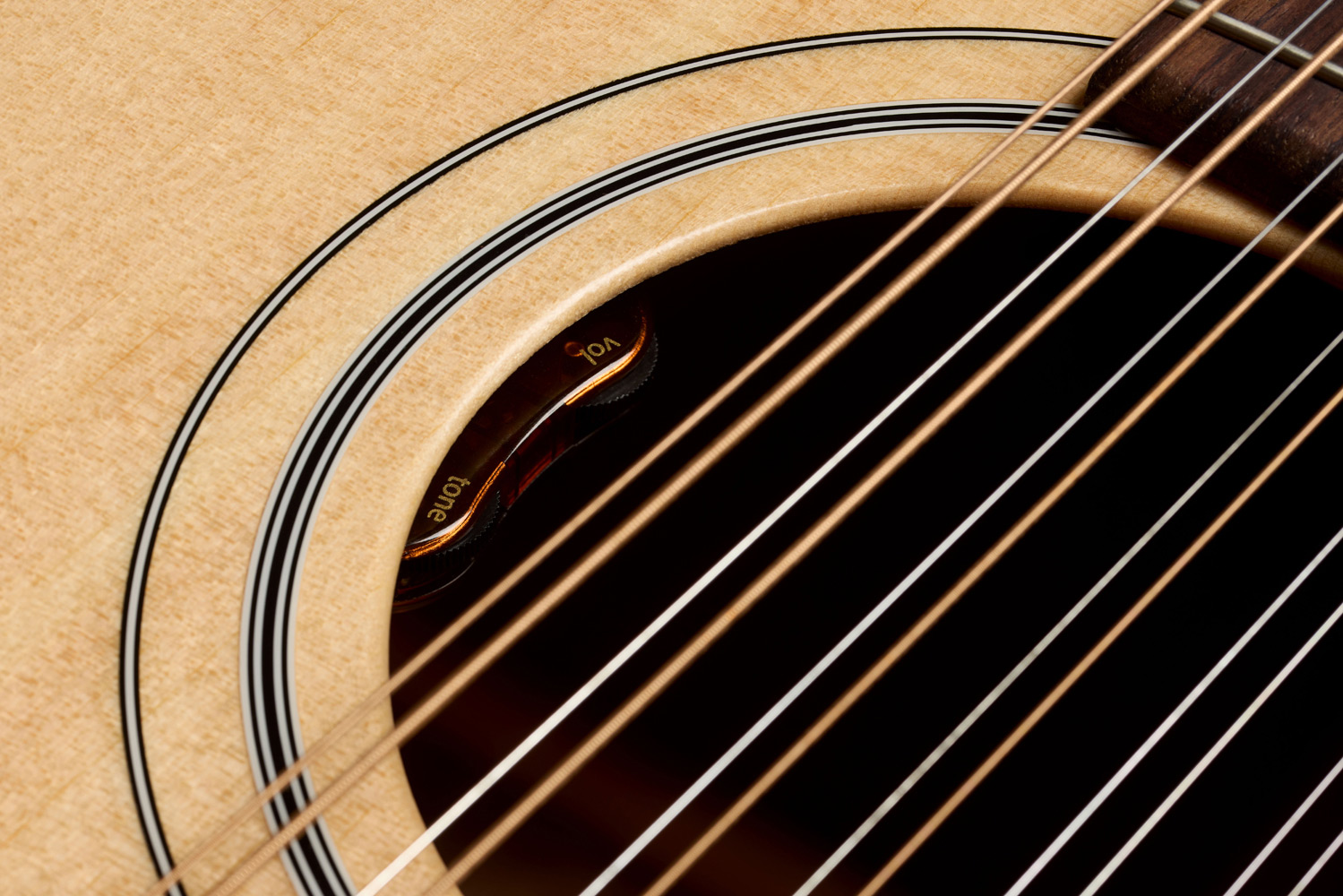 Close-up of F-412E Standard Natural soundhole showing L.R. Baggs Element VTC pickup system