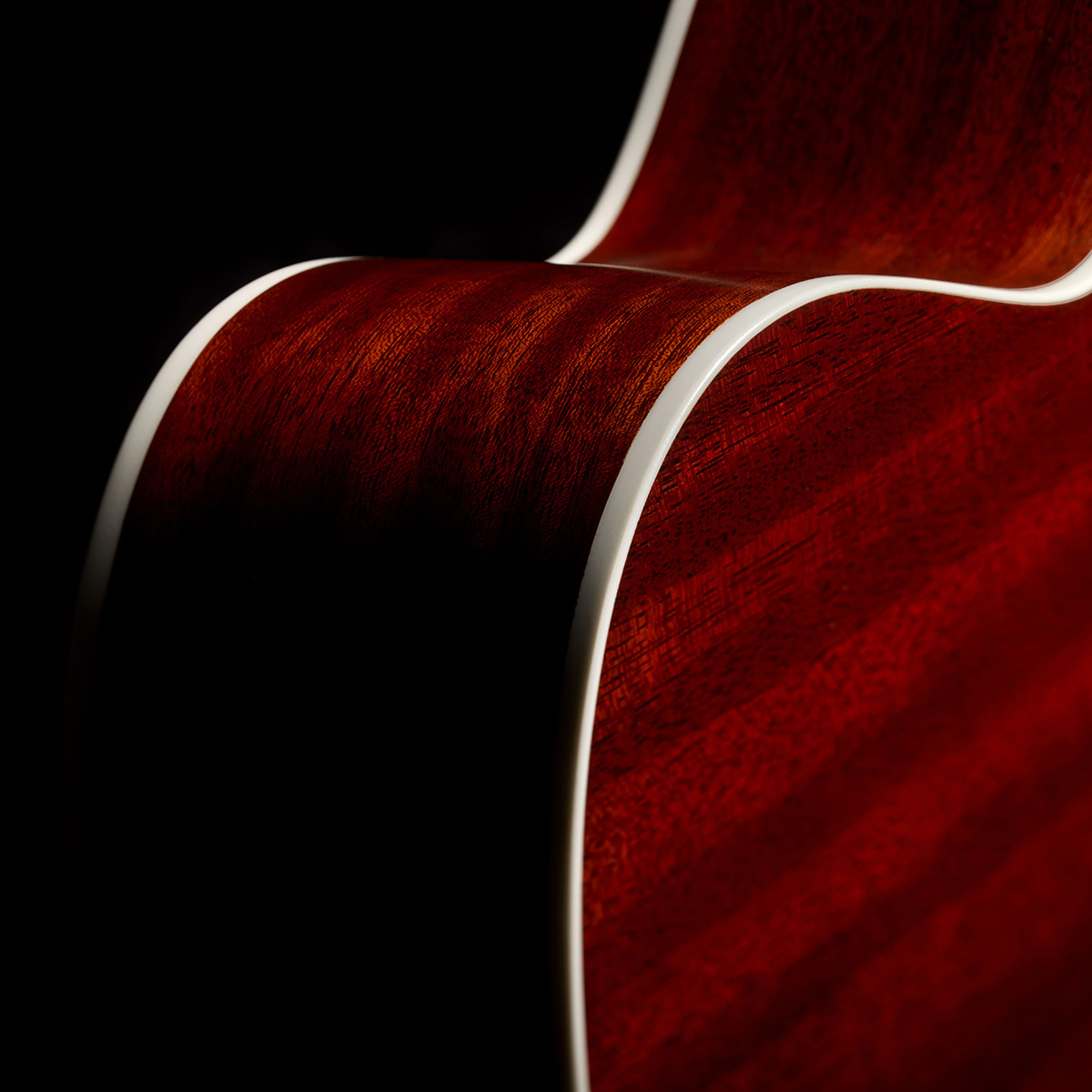 Close-up of F-412 Standard Natural back body shoulder curve thumb