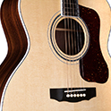 Horizontal body close-up of F-55 natural guitar thumbnail