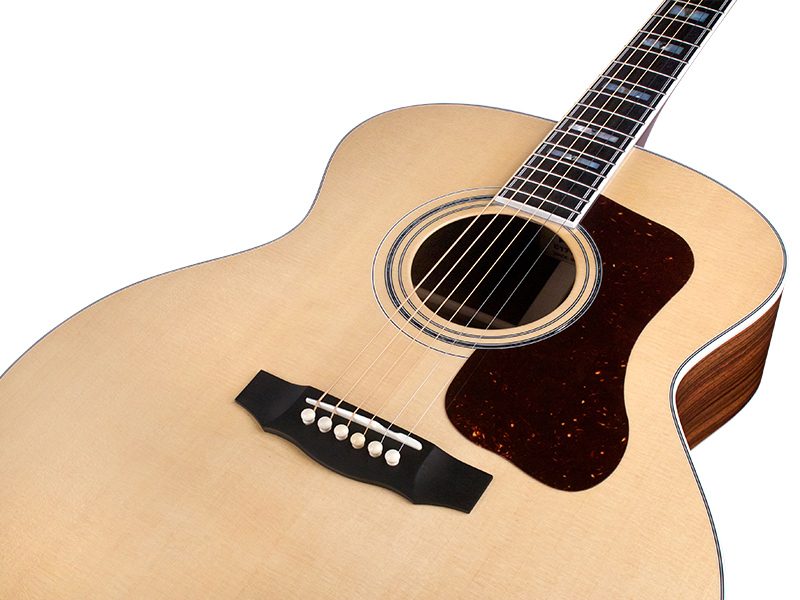 Horizontal front angle close-up view of F-55 natural guitar