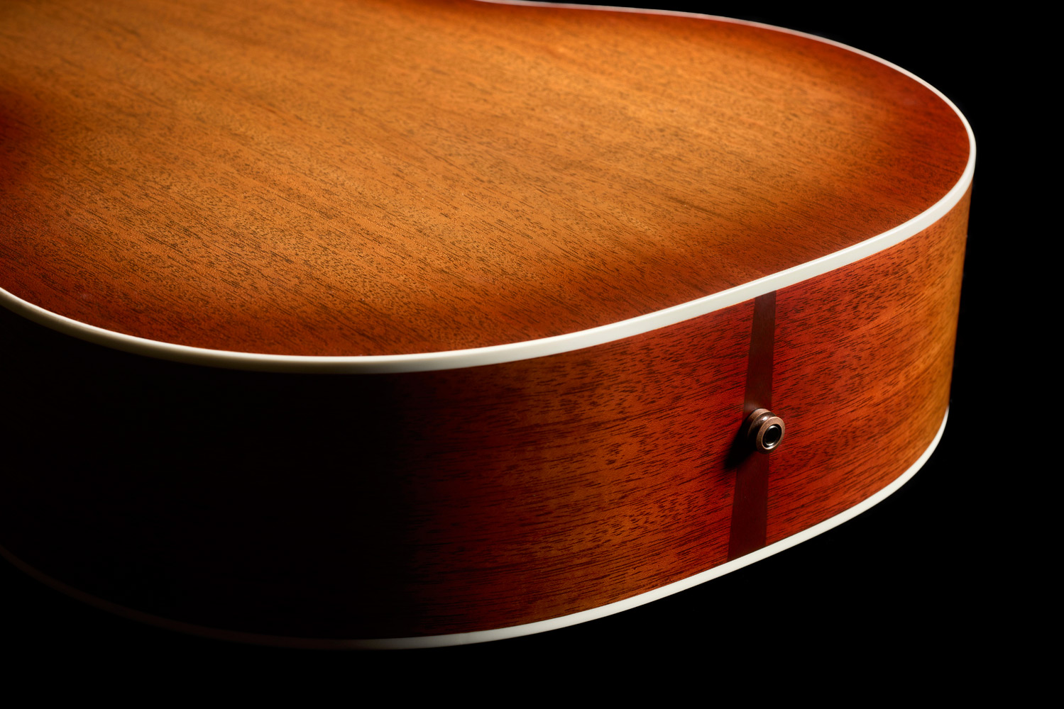 Close-up of F-412 Standard Pacific Sunset Burst strap pin