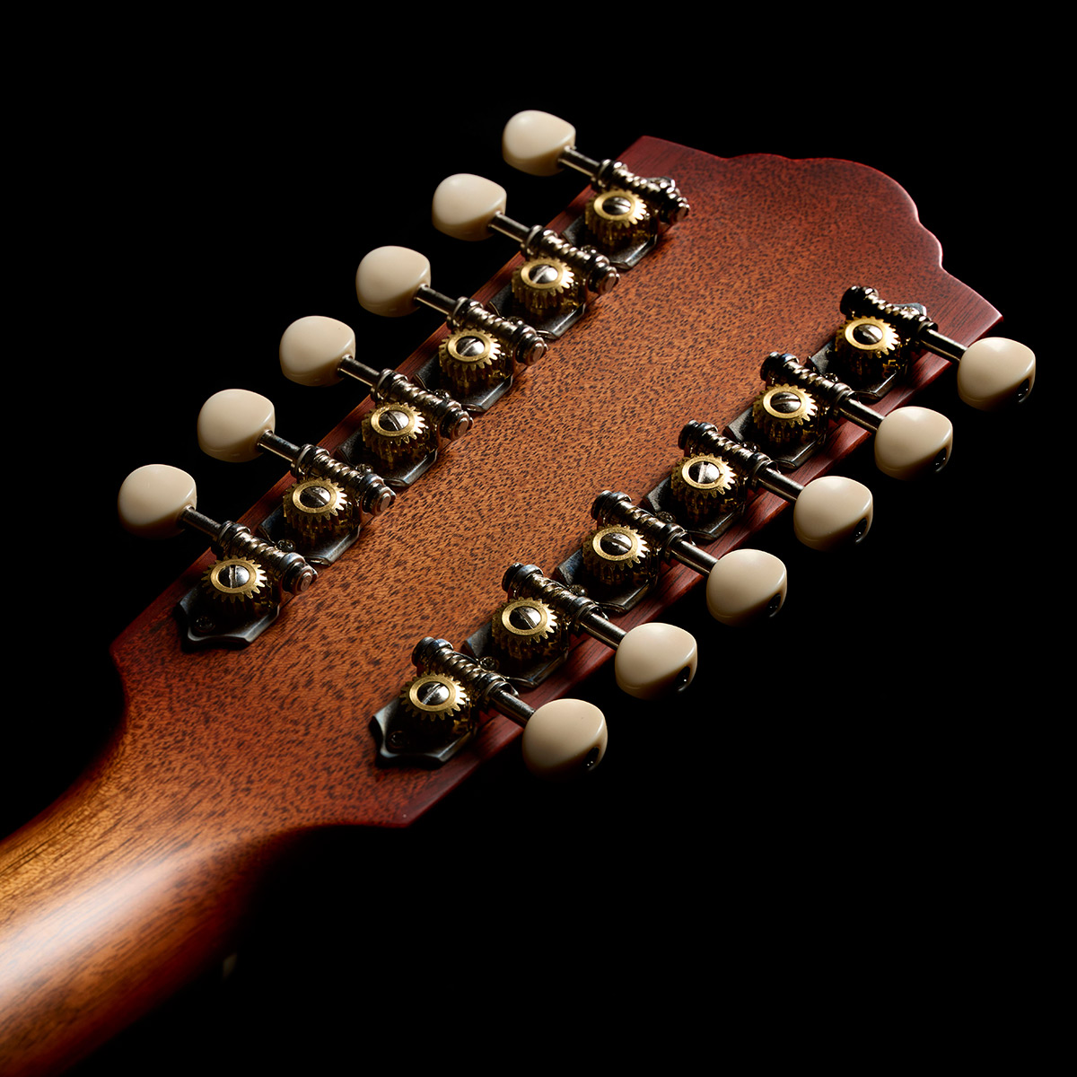 Close-up of the back of the F-412 Standard Pacific Sunset Burst headstock thumb