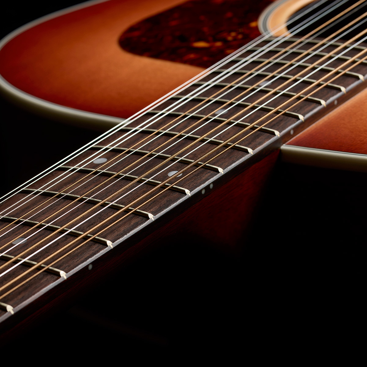 Top down view of F-412 Standard Pacific Sunset Burst neck and strings thumb