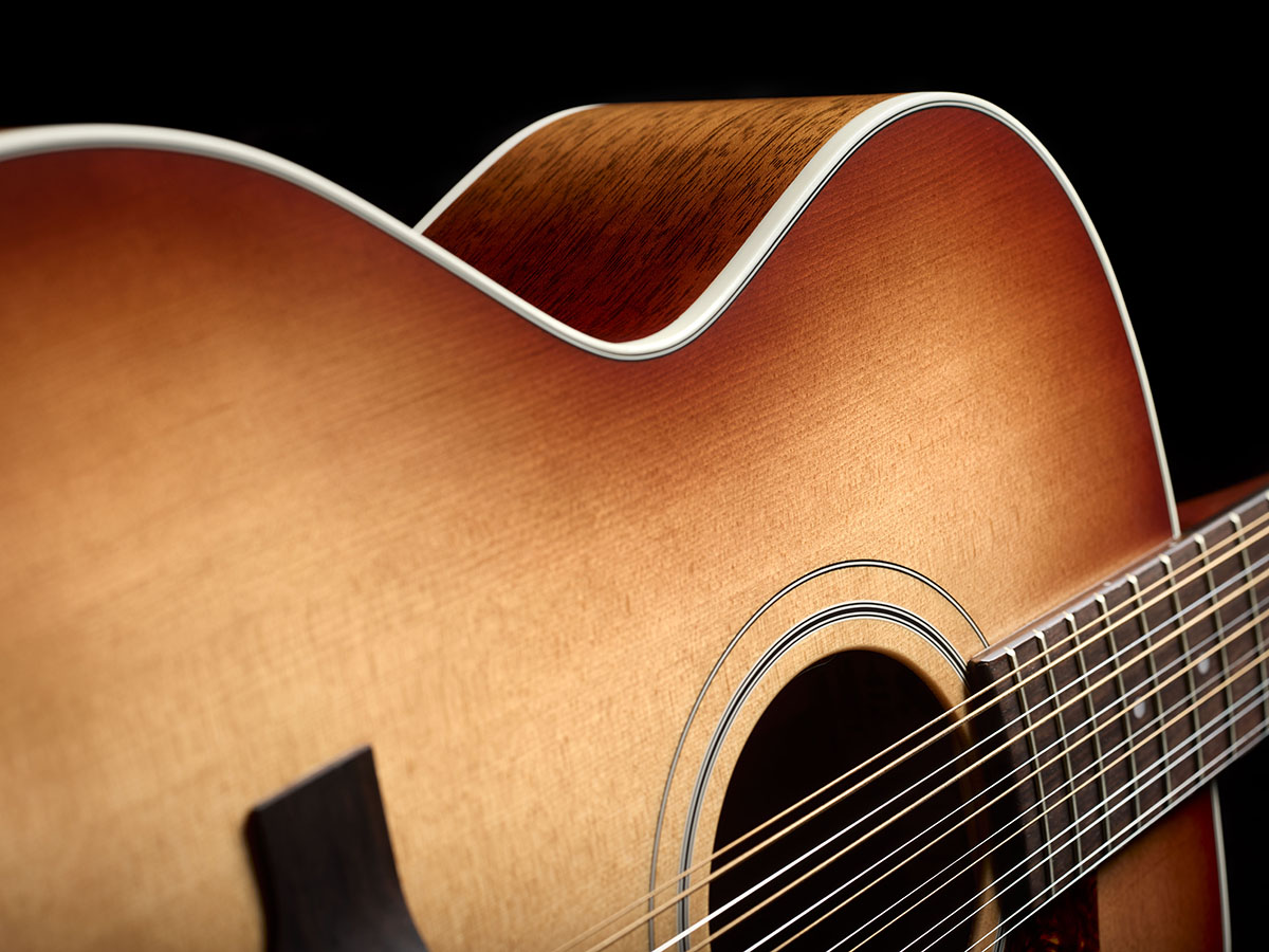 Close-up of The F-412 Standard Pacific Sunset Burst side curve showcasing solid Sitka spruce top and solid African mahogany sides