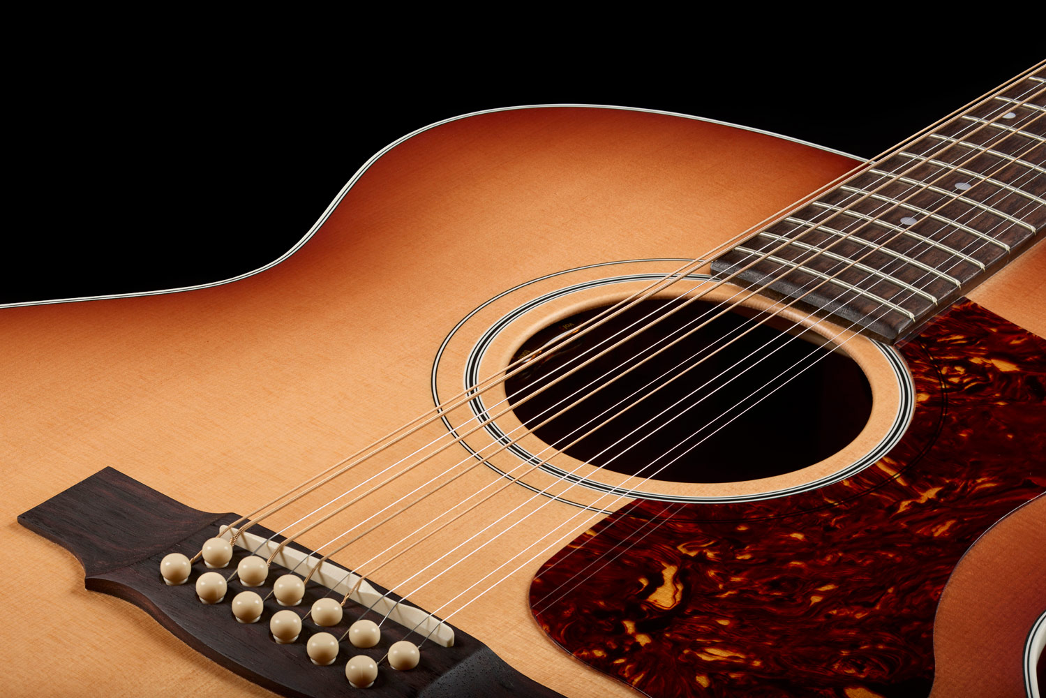 Top down view of F-412 Standard Pacific Sunset Burst soundhole and bridge