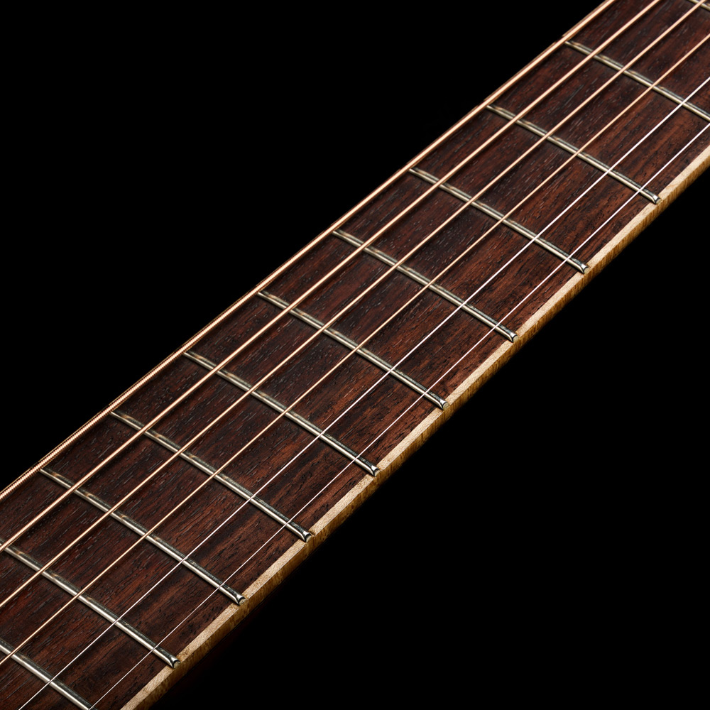 Close-up of VR1 F-40 Au Naturel neck showcasing C-Shape mahogany neck with walnut center strip thumb