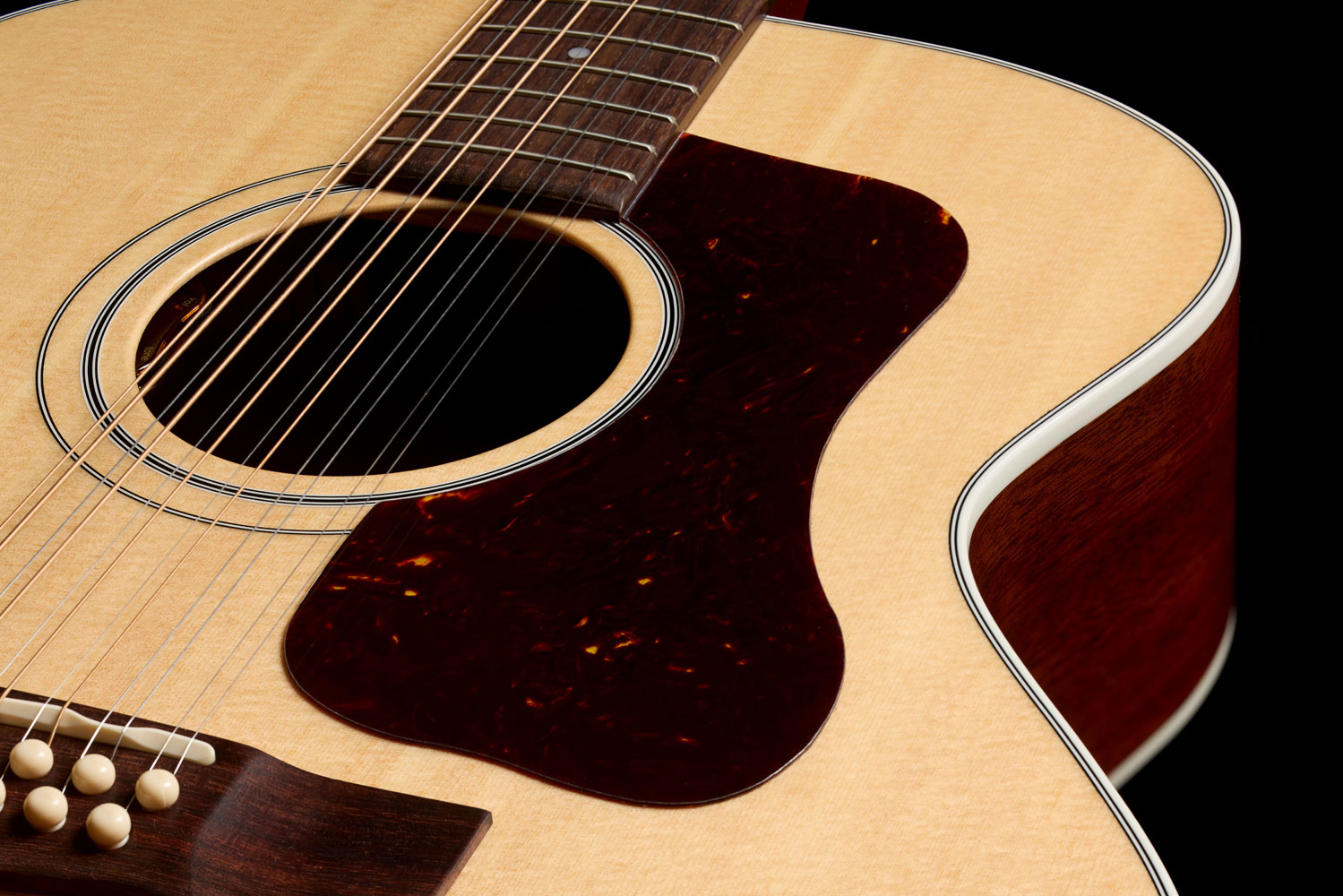 Close-up of F-412E Standard Natural soundhole showing L.R. Baggs Element VTC pickup system and pickguard