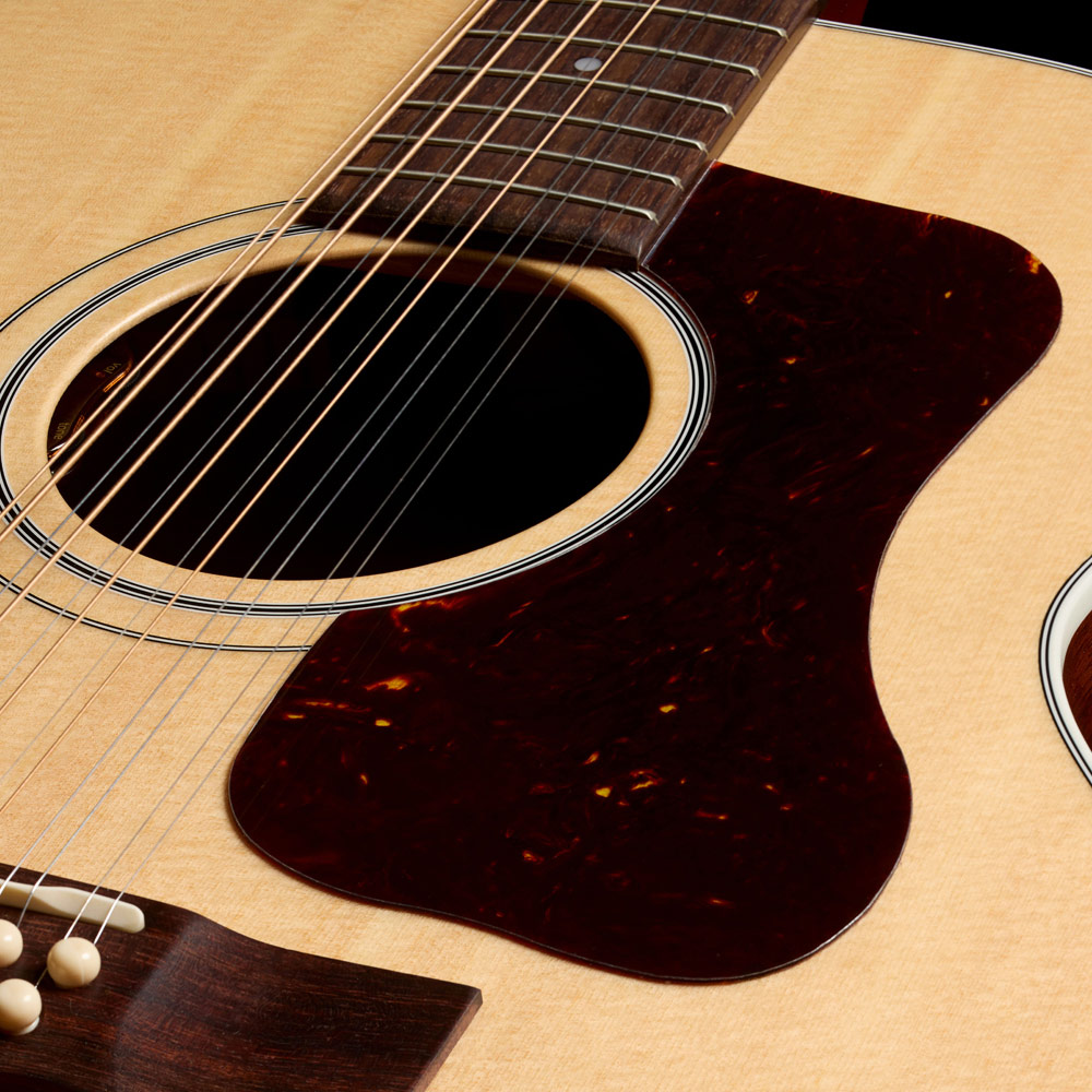 Close-up of F-412E Standard Natural soundhole showing L.R. Baggs Element VTC pickup system and pickguard thumb