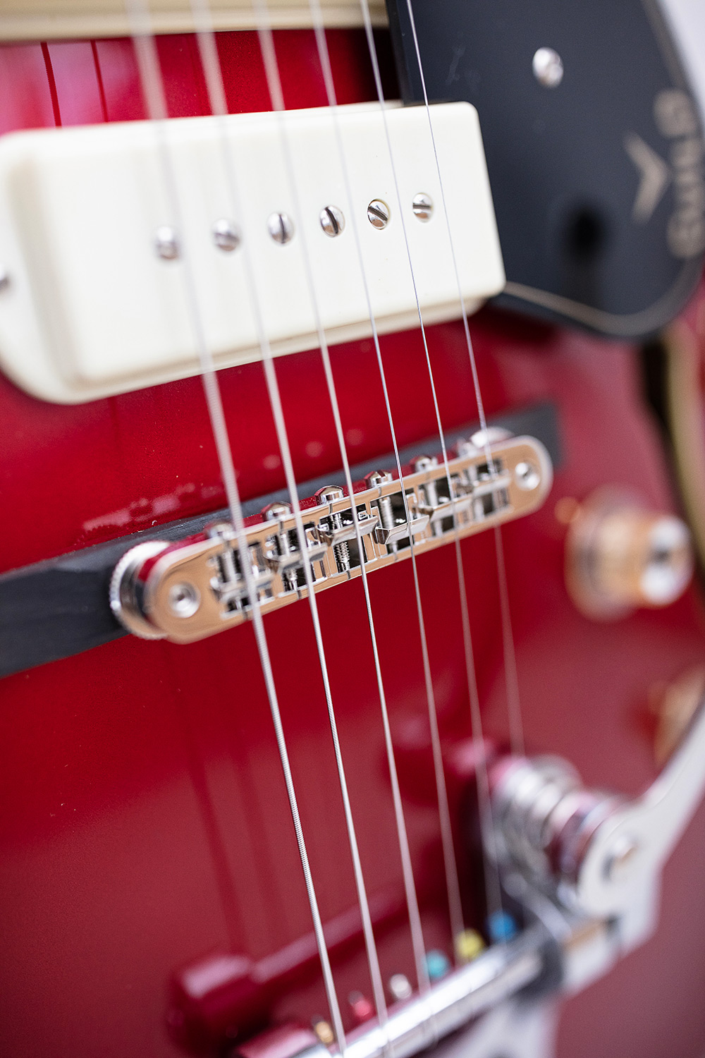Close up of X-350 Stratforde Scarlet Red pickup and bridge