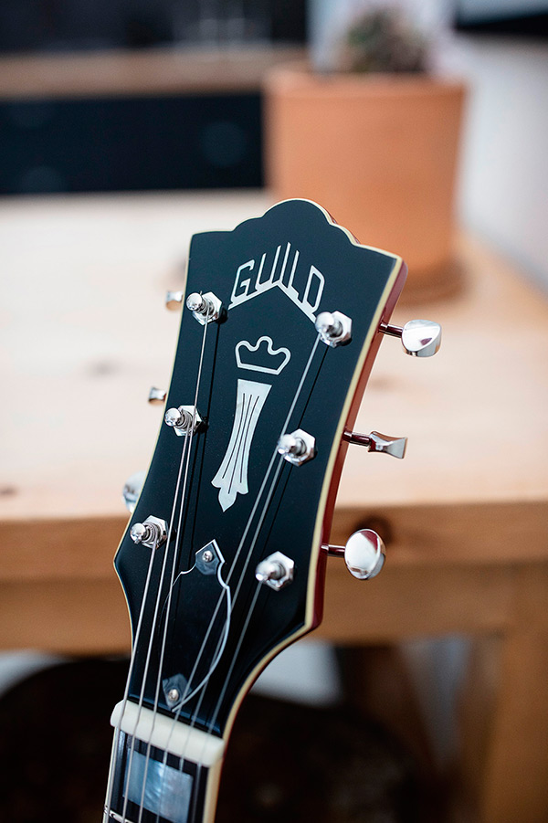 Close up of X-350 Stratford guitar head with Guild Peak logo thumbnail