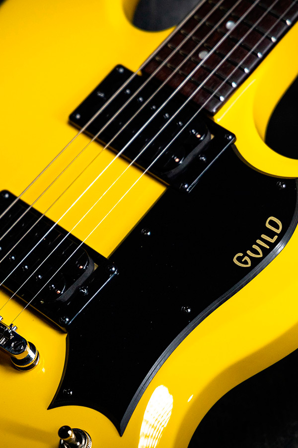 Close up of Polara Voltage Yellow pickups, bridge, and strings thumbnail