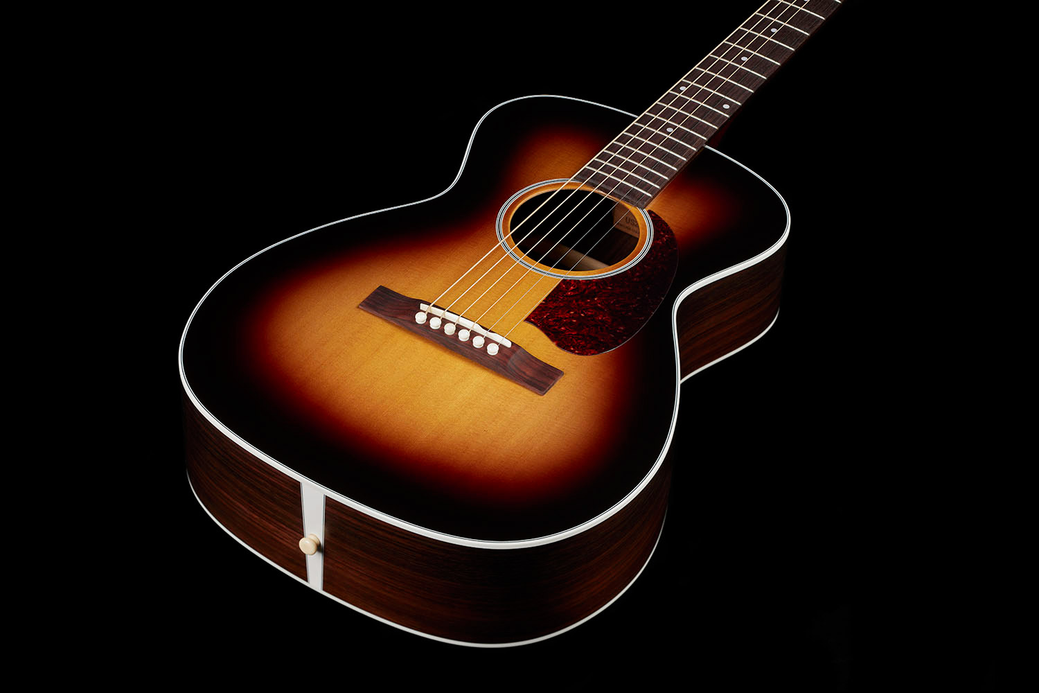 View of M-50 Standard Antique Burst body showcasing solid Sitka spruce top