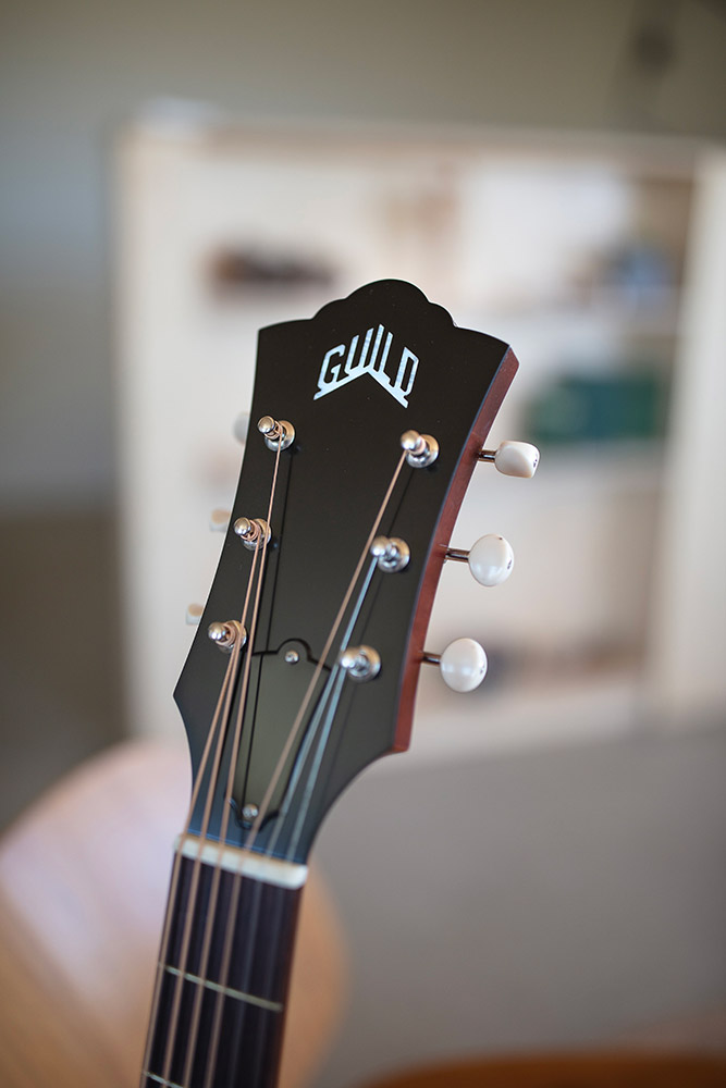 Close up of D-40 Standard headstock with Guild peak logo