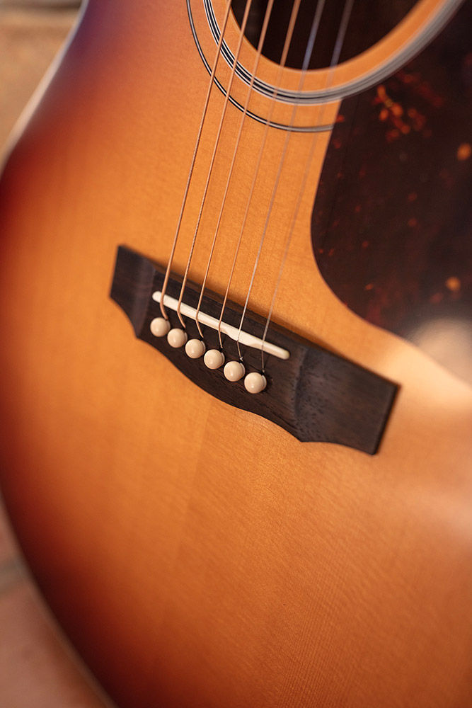 Close-up of F-40 Standard Pacific Sunset Burst bridge