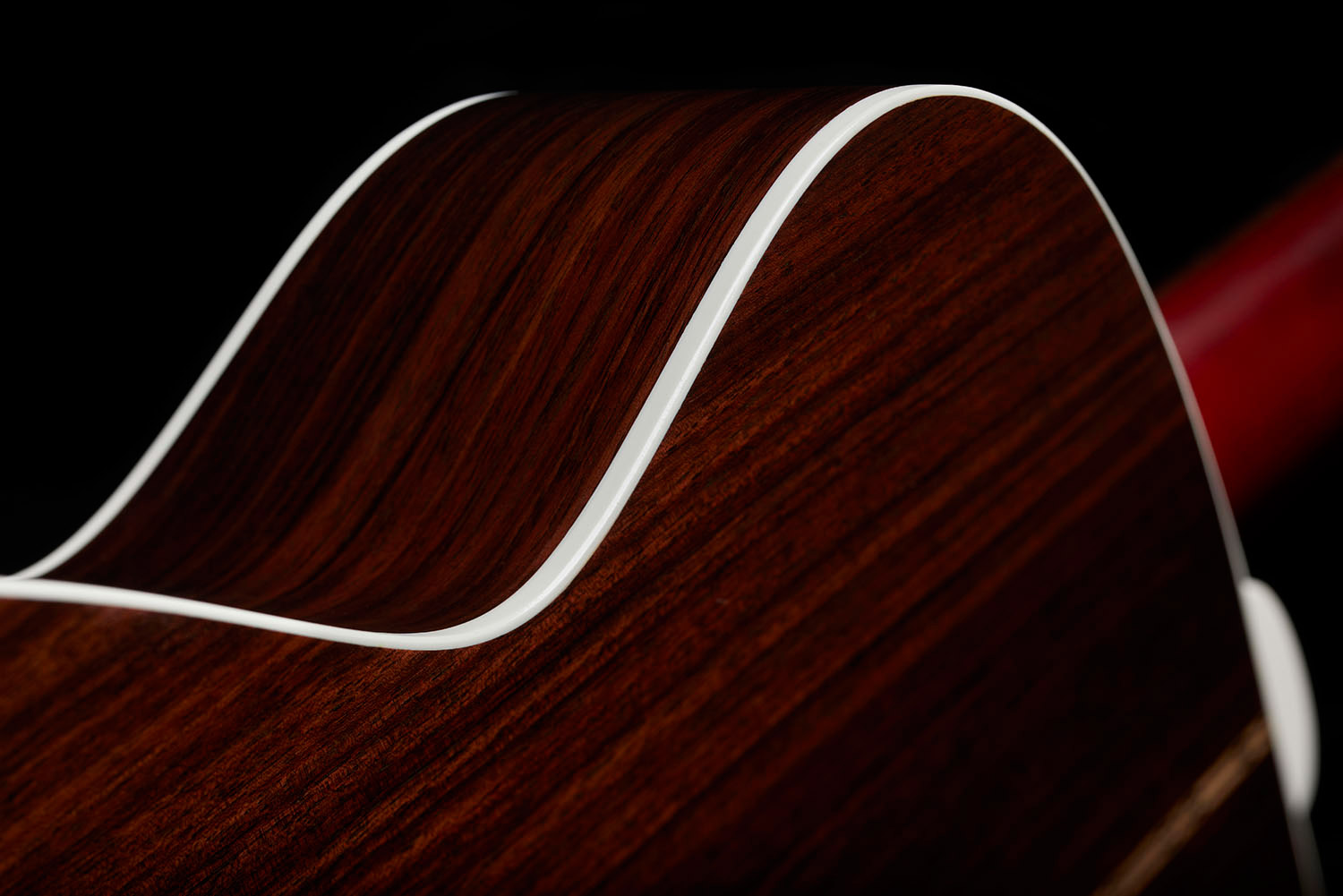 Close-up of M-50 Standard Antique Burst back and side showcasing solid Indian rosewood and white ABS binding