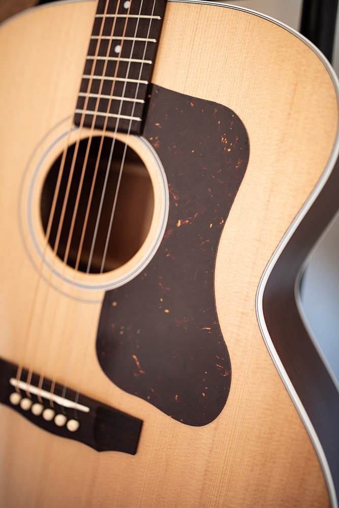 Close-up of F-40 Standard Natural soundhole and pickguard