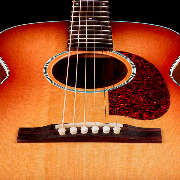 View of M-40 Standard Pacific Sunset Burst body showcasing solid Sitka spruce top thumb