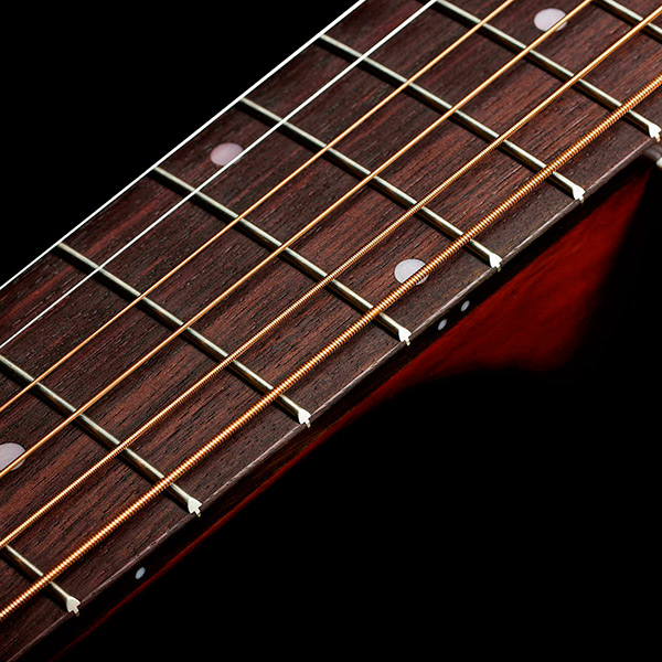 Close-up of the M-40 Standard Pacific Sunset Burst neck thumb