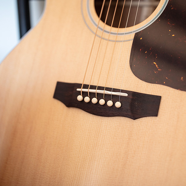 Close-up of F-40 Standard Natural bridge thumb