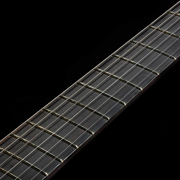 Close-up of Polara Limited Night Edition Vintage Walnut neck thumb