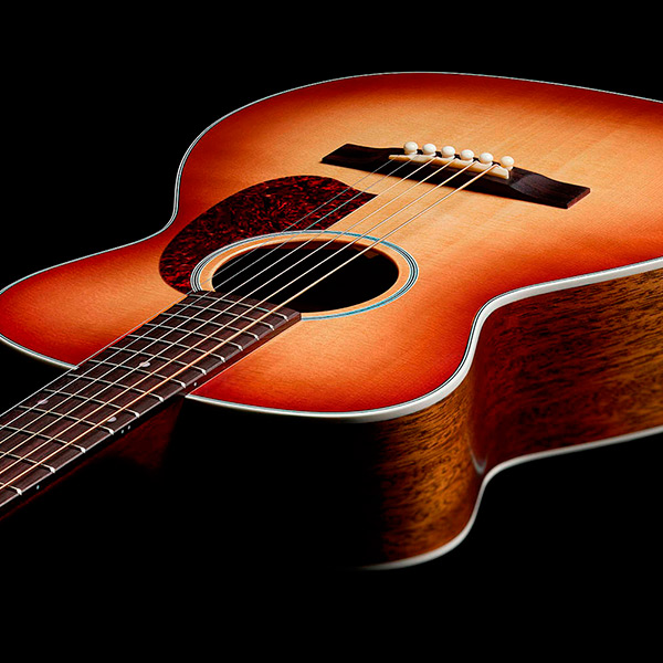 View of M-40 Standard Pacific Sunset Burst body showcasing solid Sitka spruce top and solid African Mahogany sides thumb