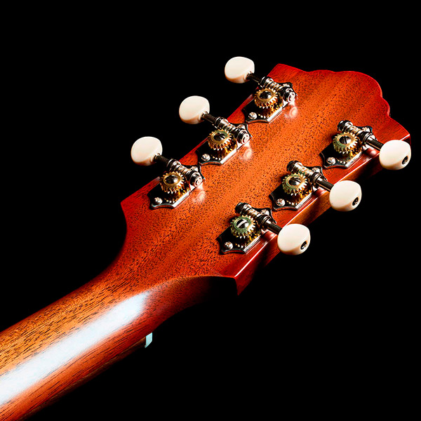 Close-up of back of the M-40 Standard Pacific Sunset Burst headstock thumb