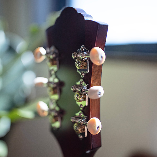 Close-up of the back of the F-40 Standard Pacific Sunset Burst headstock thumb