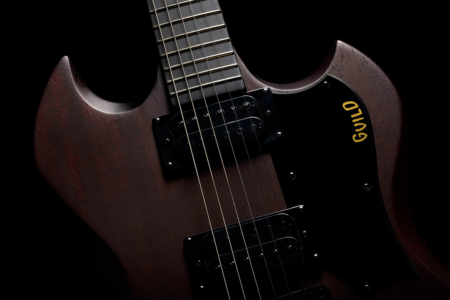Close-up of Polara Limited Night Edition Vintage Walnut body