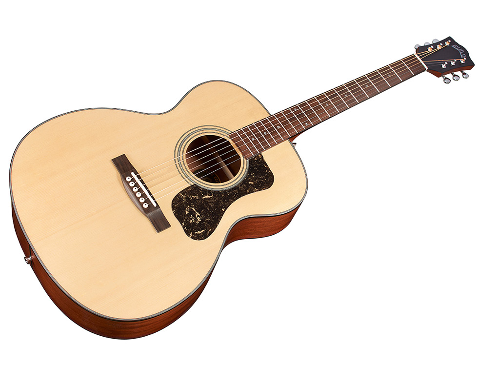 Angled front  view of the Guild OM-340 acoustic guitar